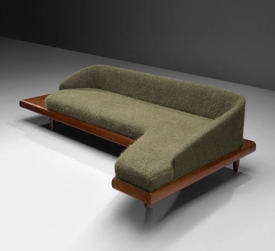 Green Boucle Corner Sofa on Walnut Platform